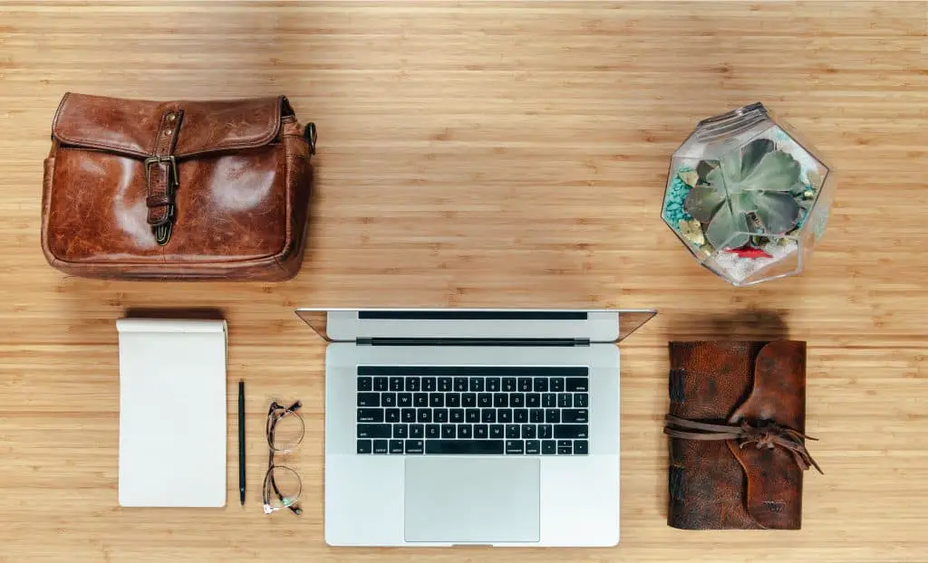 workspace-flatlay-with-leather-bag-and-notebook_4460x4460