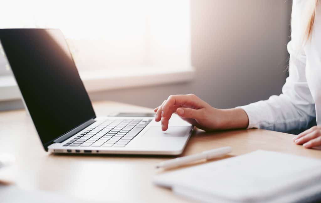 woman controlling touchpad