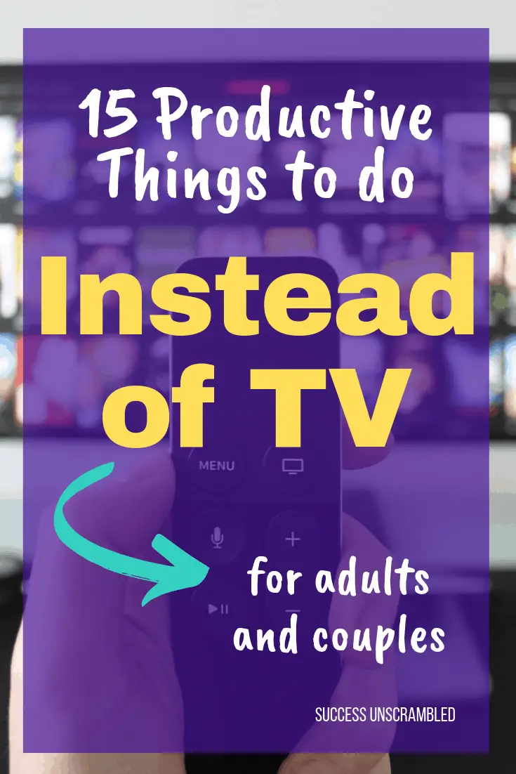 hand holding TV remote