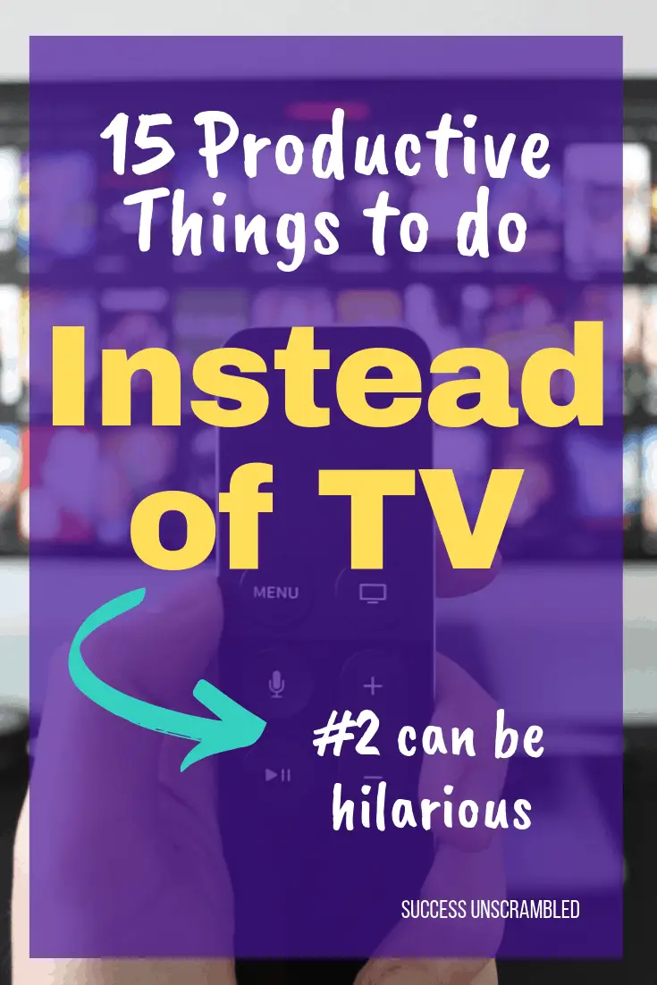 hand holding TV remote