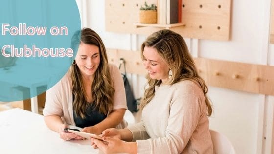 two woman talking about their devices