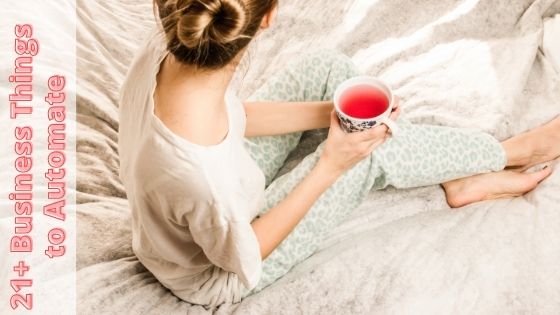 woman in pajama drinking tea while sitting on bed