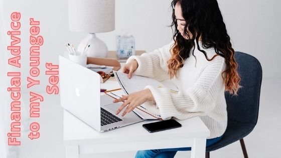 woman looking through some of her papers in a desk