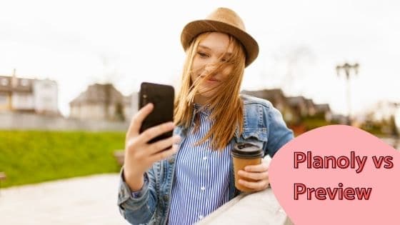 woman taking a selfie with her brown hat and a denim jacket 