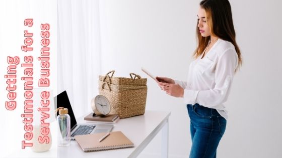 standing woman using her tablet