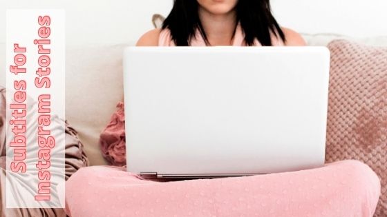 woman sitting with a laptop on her lap