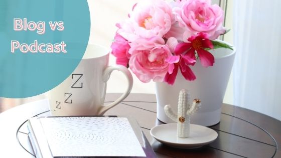 tablet, coffee mug and a flower vase