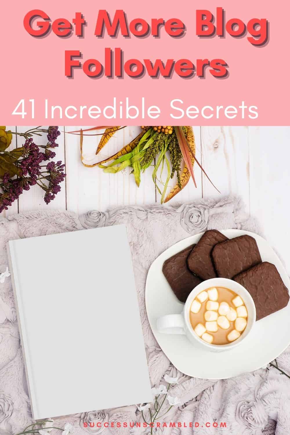 photo of a notebook next to a plate with chocolate biscuits and hot chocolate