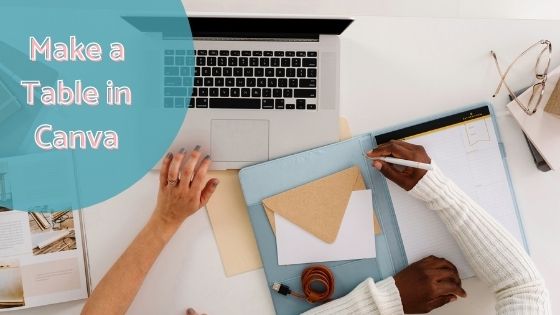 photo of a laptop on a desk and two women's hands on the desk