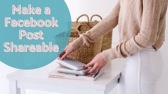 woman organizing pile of notebooks