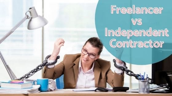 woman with both chained hands while sitting on her desk