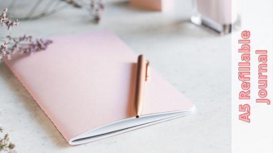 pink journal refill and a pen