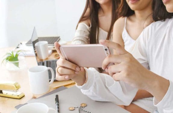 a photo of a three woman taking a selfie