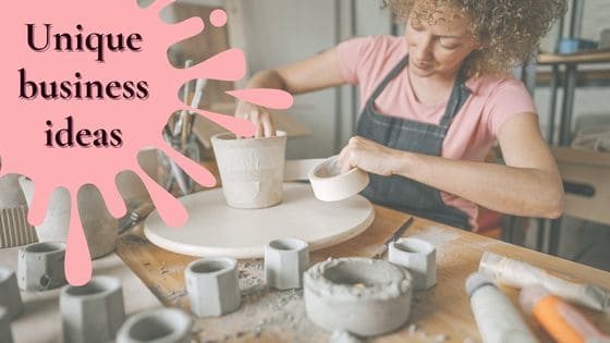 Photo of women working with clay making pottery items