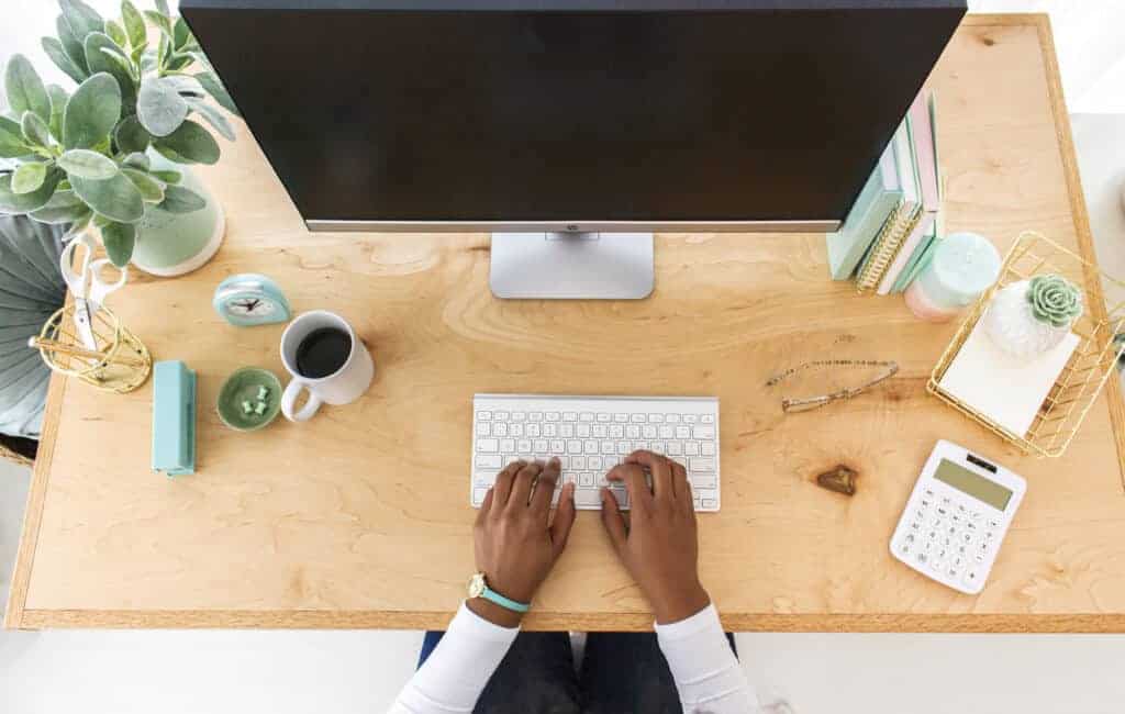 woman's hand on a keyboard