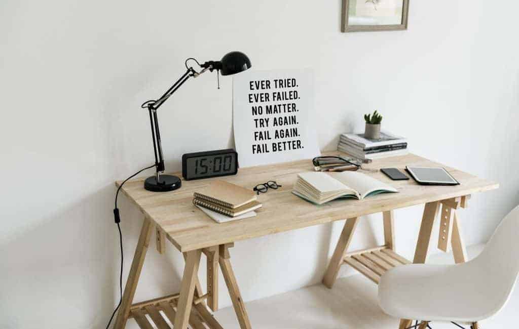 desk setup with motivational poster