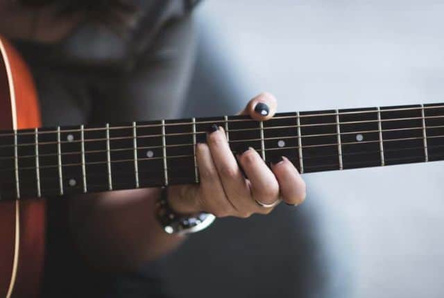 playing guitar fretboard