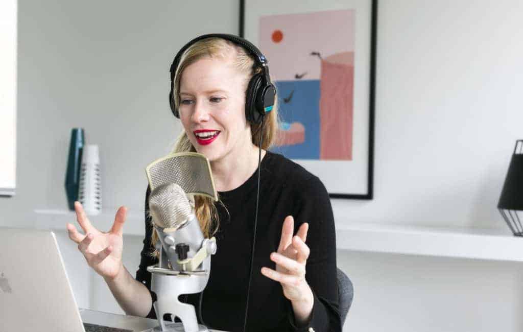 woman recording a podcast