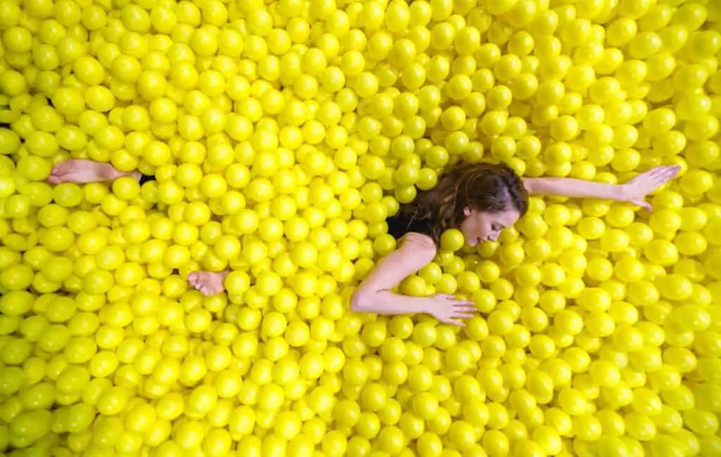 swimming in a yellow ball pit