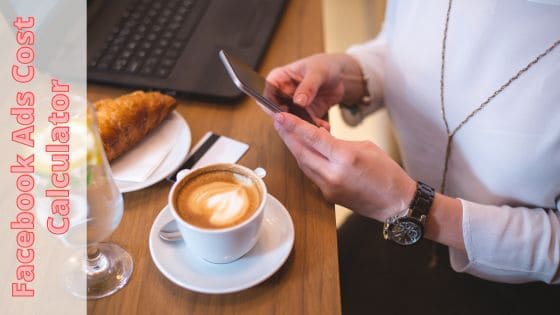 photo of a person holding a smartphone looking at their Facebook Ads cost calculator