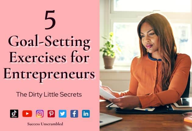 photo of a woman at her desk doing goal-setting exercises